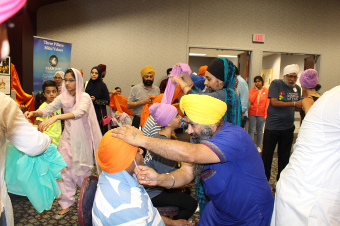 Turban Tying at the Festival.JPG