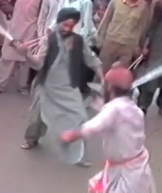 afghan sikh men gatka.jpg