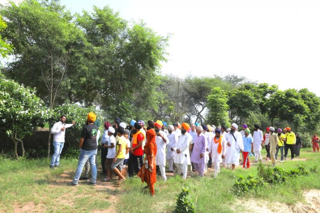 baag Garden walk with press.jpg